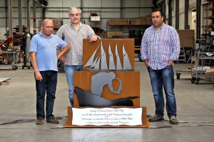 Photo Credit: The memorial was designed by the Portuguese artist Antonio Neves (centre). It will be delivered to St.John's on a Portuguese Nval vessel on Friday, August 14.
