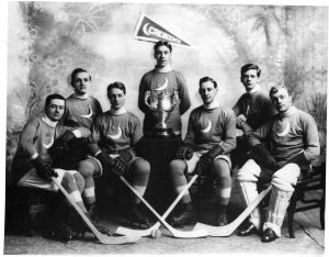 Photo Credit: The Rooms Provincial Archives: The Crescents Hockey Team was considered the best team in Newfoundland at the outbreak of the Great War in 1914. The team signed up almost to a man. Photo Number: 1.26.01.061 Left to right: E. Townshend, Don Trapnell, Will Herder, C. Tessier, George Marshall, Gus Herder and Ralph Burnham.