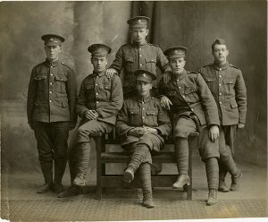 Photo Credit: The Rooms Provincial Archives: A 97-5. The Regimental service hat with the caribou pin was introduced in 1916. Can you identify any of these Newfoundland soldiers?